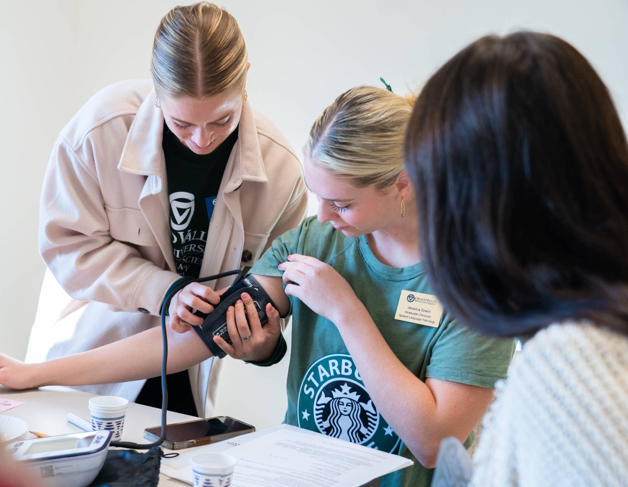 Students monitoring vitals pre- and post-swallowing activity to compare the difference from the baseline